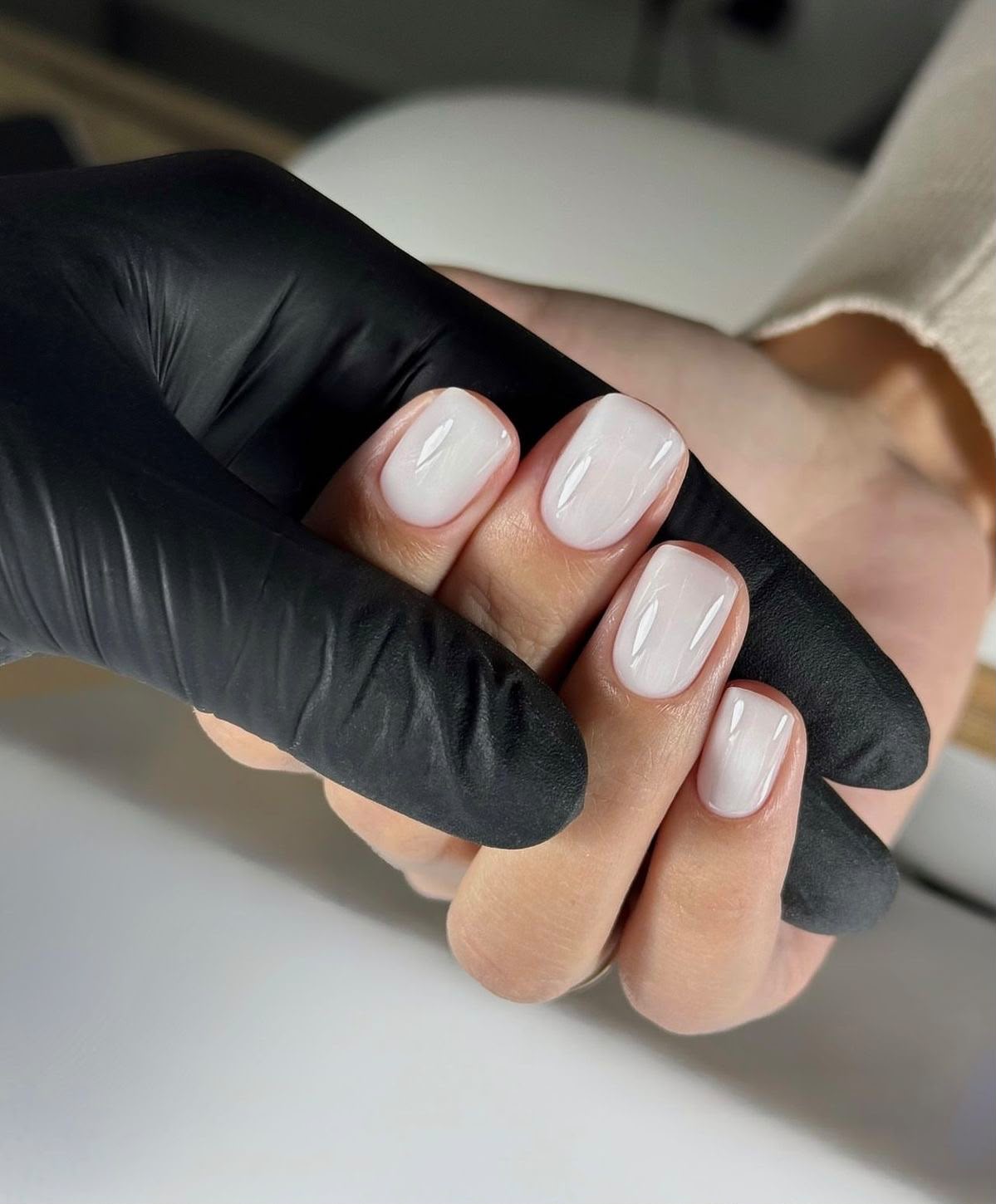 Glossy milky white short square gel manicure